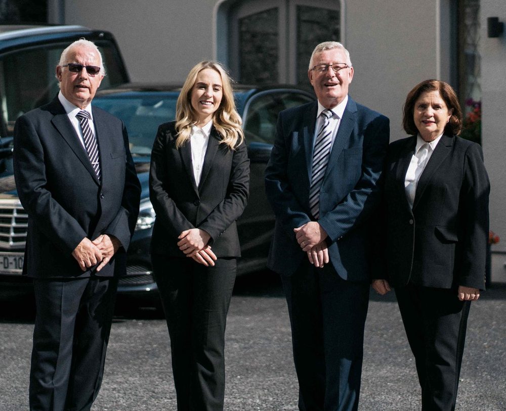 The Irwin family outside Irwins Funeral Directors, Galway